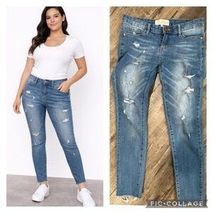 Distressed raw hem skinny jeans